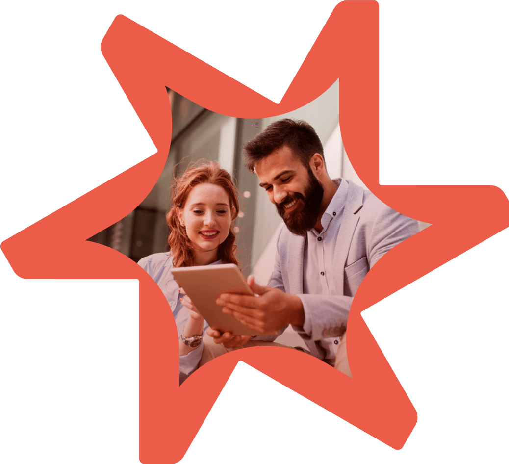 Two professionals using tablet to collaborate on digital commerce projects