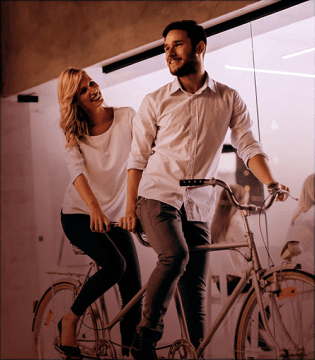 Two persons on a bike_image